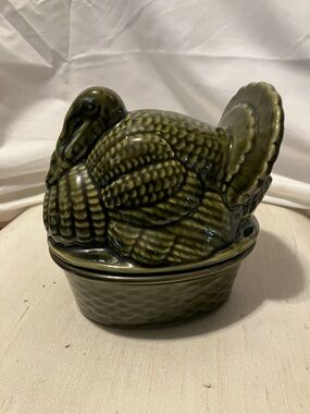 Vintage. Roughly 1970s - simply because of rare olive green ceramic